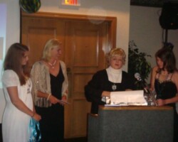Kate, Deborah & Rebekah presenting a picture collage to Jo Parris